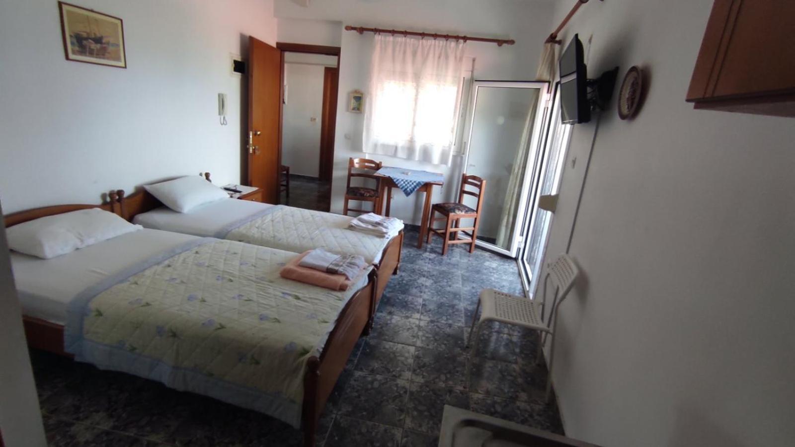 Peristerianos Apartments เนอา สกีโอนี ภายนอก รูปภาพ