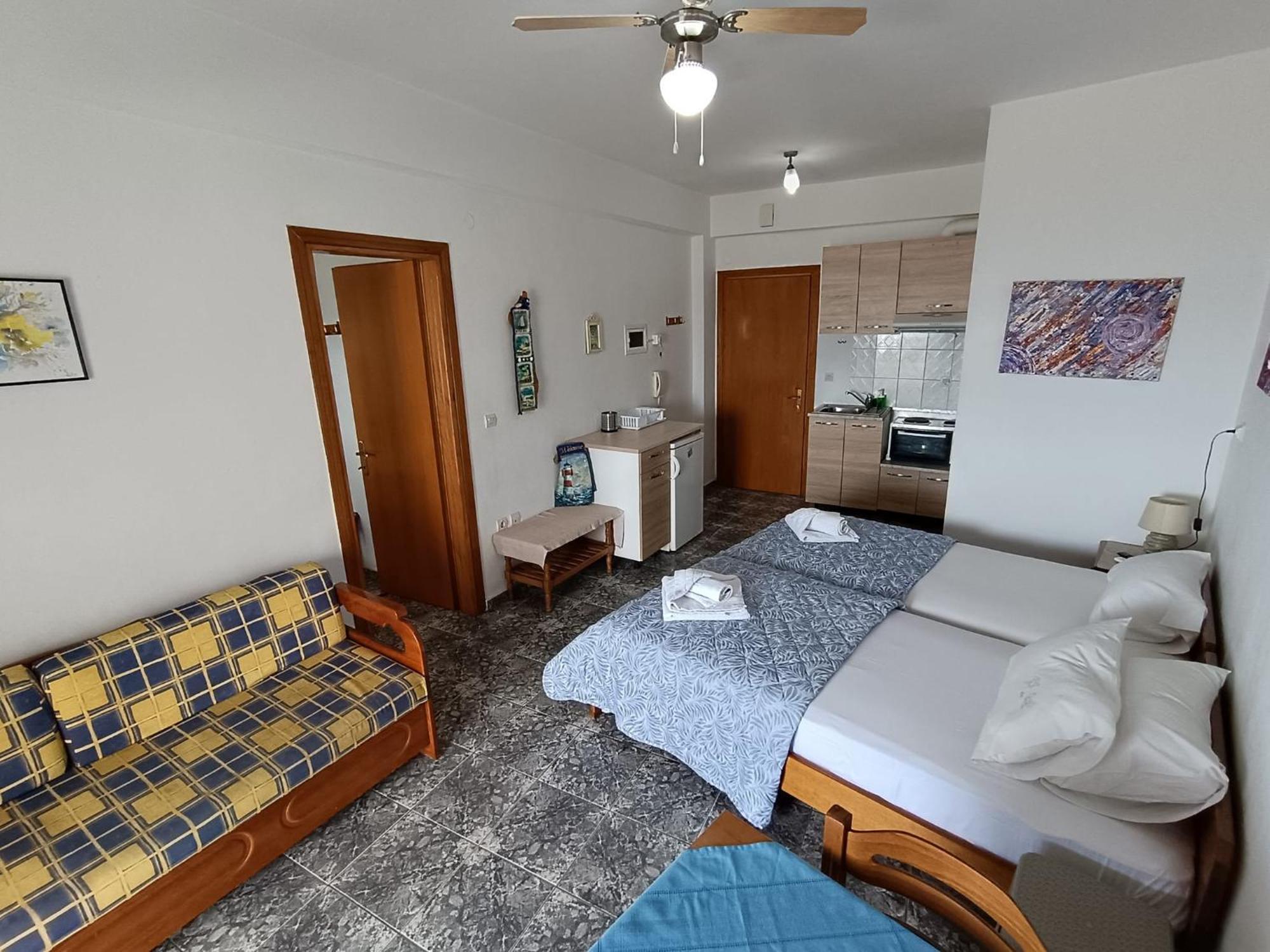 Peristerianos Apartments เนอา สกีโอนี ภายนอก รูปภาพ